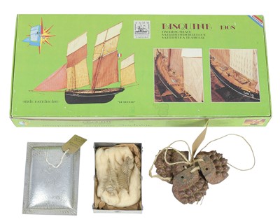 Lot 87 - Misc. lot including model ship, shells, chocolate tin etc.