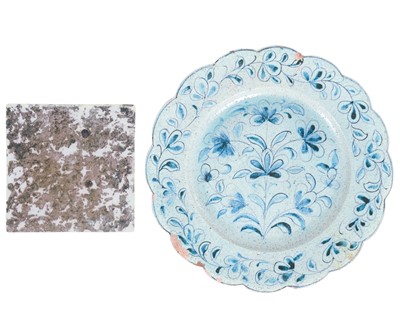 Lot 811 - An early tin glazed tile.