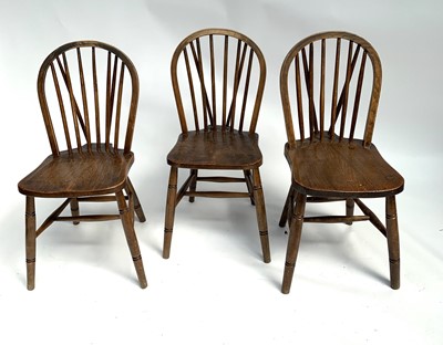Lot 3038 - An ash and elm spindle back chair, stamped...