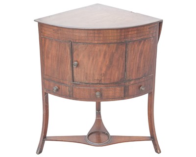 Lot 943 - A 19th century mahogany corner washstand.
