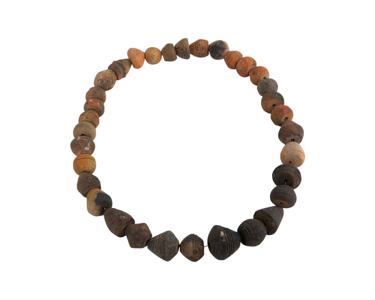 Lot 20 - A collection of 33 Mali (West Africa) terracotta spindle whorls.