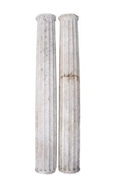 Lot 496 - A pair of carved marble pilasters with fluted shafts.