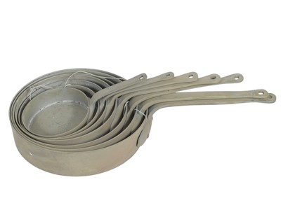 Lot 70 - A graduated set of seven copper saucepans.