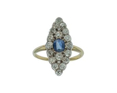 Lot 158 - An antique blue sapphire and diamond navette ring, set in yellow and white gold.