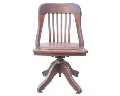 Lot 871 - A mahogany office chair.