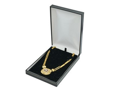 Lot 192 - LEO DE VROOMEN (1941-2025)- A fine 18k diamond and ruby set pendant necklace.
