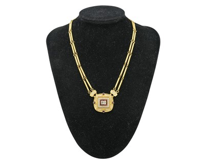 Lot 192 - LEO DE VROOMEN (1941-2025)- A fine 18k diamond and ruby set pendant necklace.