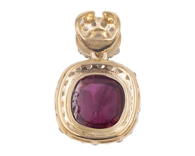 Lot 165 - A 9k yellow gold 2.78ct cushion-cut cabochon pink tourmaline and diamond set pendant.