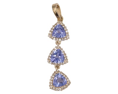 Lot 169 - A 9k yellow gold 1.59ct trillion-cut tanzanite and white sapphire set pendant.