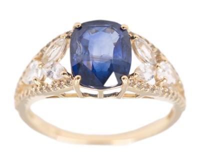 Lot 172 - A 9k yellow gold 3.70ct cushion-cut blue sapphire ring.