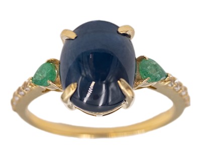 Lot 177 - A 9k yellow gold 6.99ct oval cabochon blue sapphire, emerald and white sapphire set ring.
