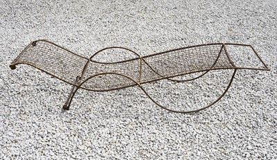 Lot 757 - A metal framed and wire mesh sun lounger.