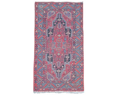 Lot 567 - A Persian wool rug.