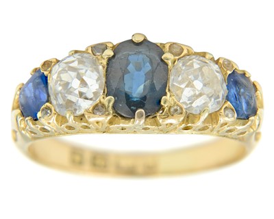 Lot 179 - A Victorian 18k diamond and sapphire set ring.