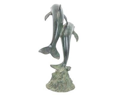 Lot 8 - A small bronze fountain head modelled as two leaping dolphins.