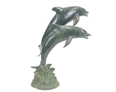 Lot 8 - A small bronze fountain head modelled as two leaping dolphins.
