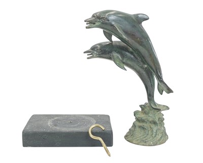 Lot 8 - A small bronze fountain head modelled as two leaping dolphins.