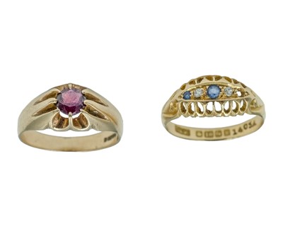 Lot 144 - Two gold gem-set rings.
