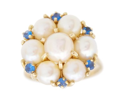 Lot 155 - A 9k hallmarked gold cultured pearl and synthetic blue spinel set dress ring.