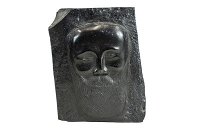 Lot 118 - A carved jet block.