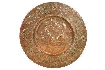 Lot 445 - An Arts and Crafts copper charger.