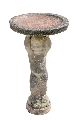 Lot 769 - A reconstituted stone bird bath.