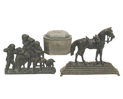 Lot 831 - A lead sarcophagus shaped lidded tobacco box.