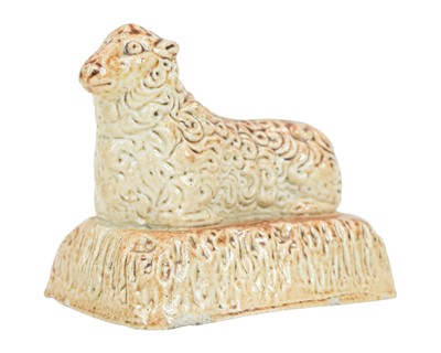 Lot 852 - A small Derbyshire salt glazed figure of a sheep.
