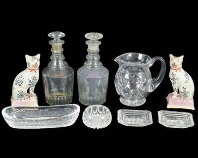 Lot 666 - A pair of late George III glass decanters and stoppers.
