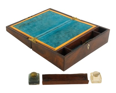 Lot 30 - A 19th century mahogany and brass bound writing slope.