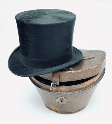 Lot 2851 - Leather top hat box and top hat, Extra Quality...