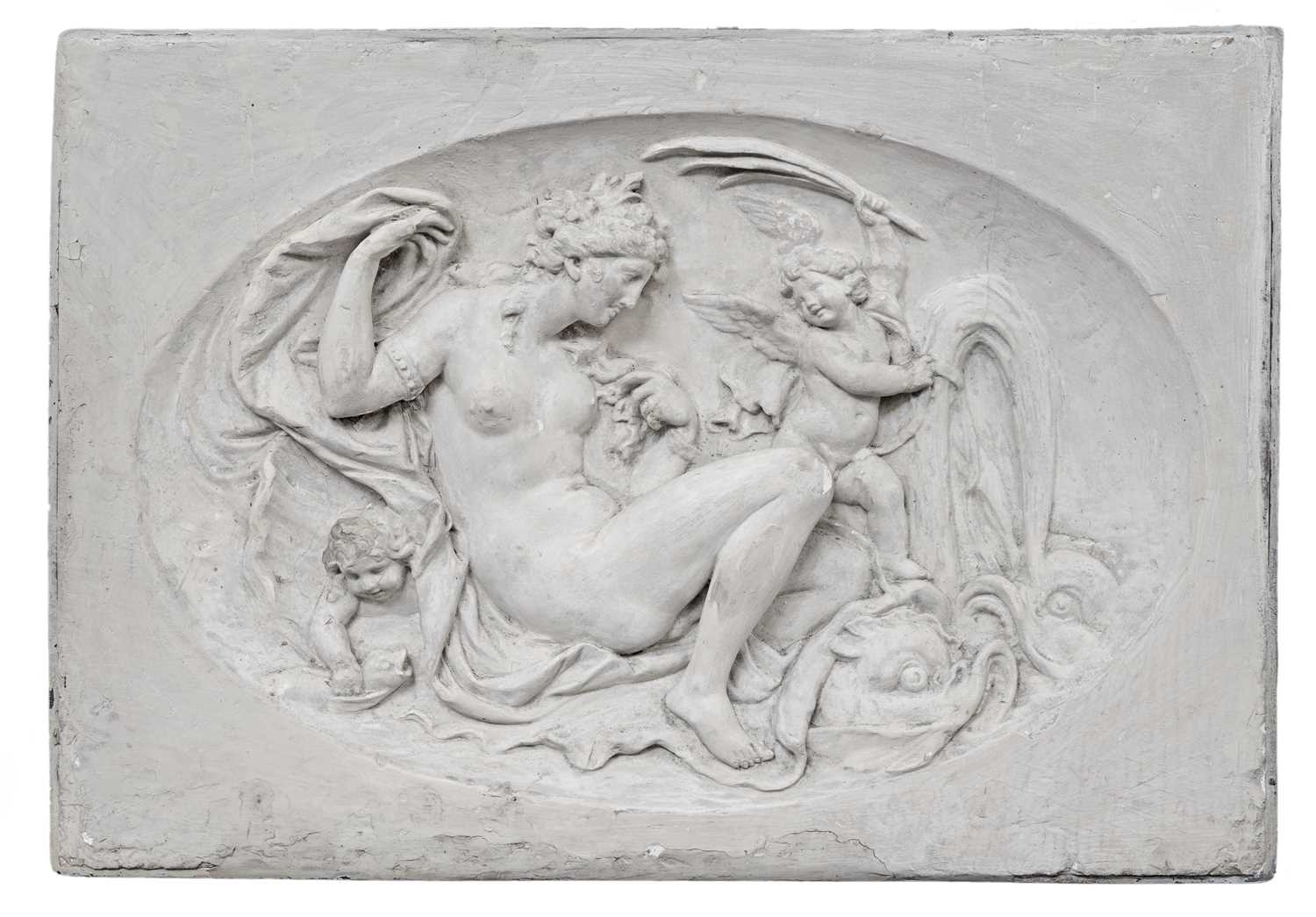 Lot 19 - A large cast plaster plaque, depicting a classical maiden, putti and dolphins.