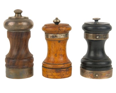 Lot 473 - A late Victorian silver mounted turned yew wood pepper mill.