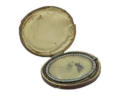 Lot 160 - A good Georgian black dot paste oval miniature frame, set in gold, within original box with silk interior.