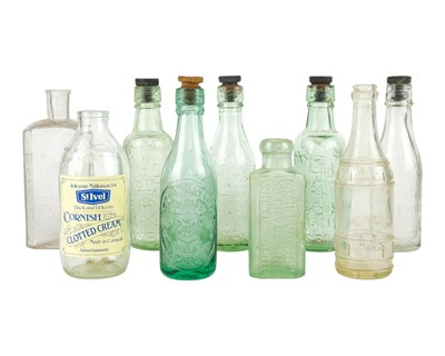 Lot 706 - A collection of glass bottles and stoppers.