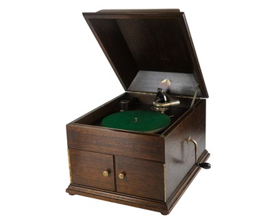 Lot 431 - An HMV oak cased table top gramophone.