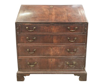 Lot 887 - A George III mahogany bureau.