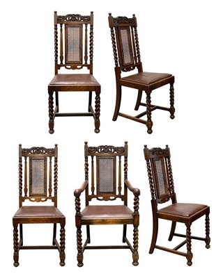 Lot 915 - A set of five Carolean style oak dining chairs.