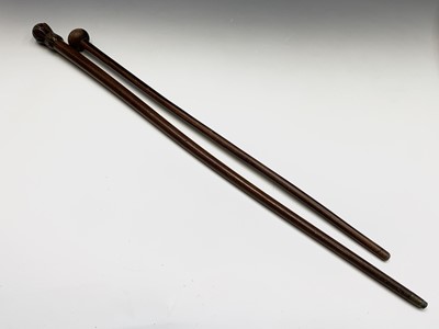 Lot 16 - A lignum vitae cane, with turned knop,...