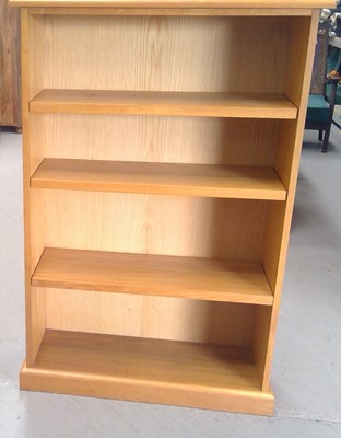 Lot 13 - A Blonde Oak Bookcase. 122cm tall, 82cm wide...