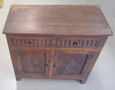 Lot 24 - A Bevan Funnell Reprodux Oak Cupboard. 87cm...