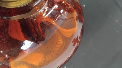 Lot 35 - A Victorian cranberry glass oil lamp.