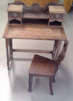Lot 19 - A Victorian Carved Oak Fold Down Writing Desk...