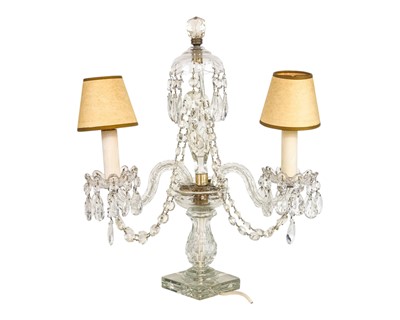 Lot 794 - A cut glass twin branch table candelabrum.