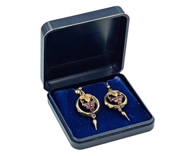Lot 175 - A Victorian gold pair of almandine garnet-set fruiting vine drop earrings.