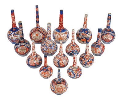 Lot 549 - A collection of 15 Japanese Imari shaft and globe vases.