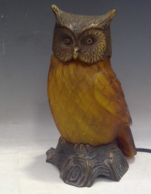 Lot 10 - A Bronze Head and Base Owl Lamp with an Amber...