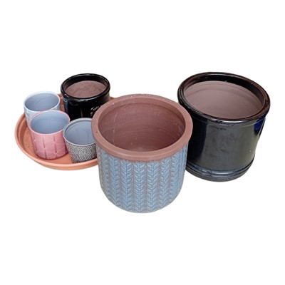 Lot 66 - Glazed and terracotta plant pots with two...
