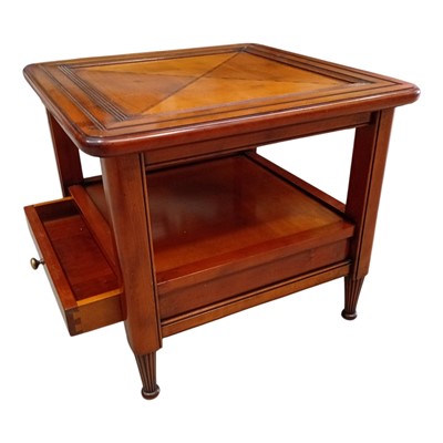 Lot 68 - A hardwood coffee table with a built-in drawer....