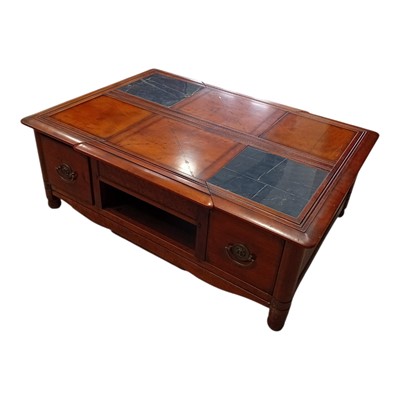 Lot 62 - A large hardwood coffee table with drawers and...